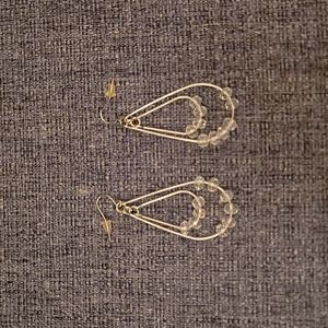 Dangling silver earings with crystals